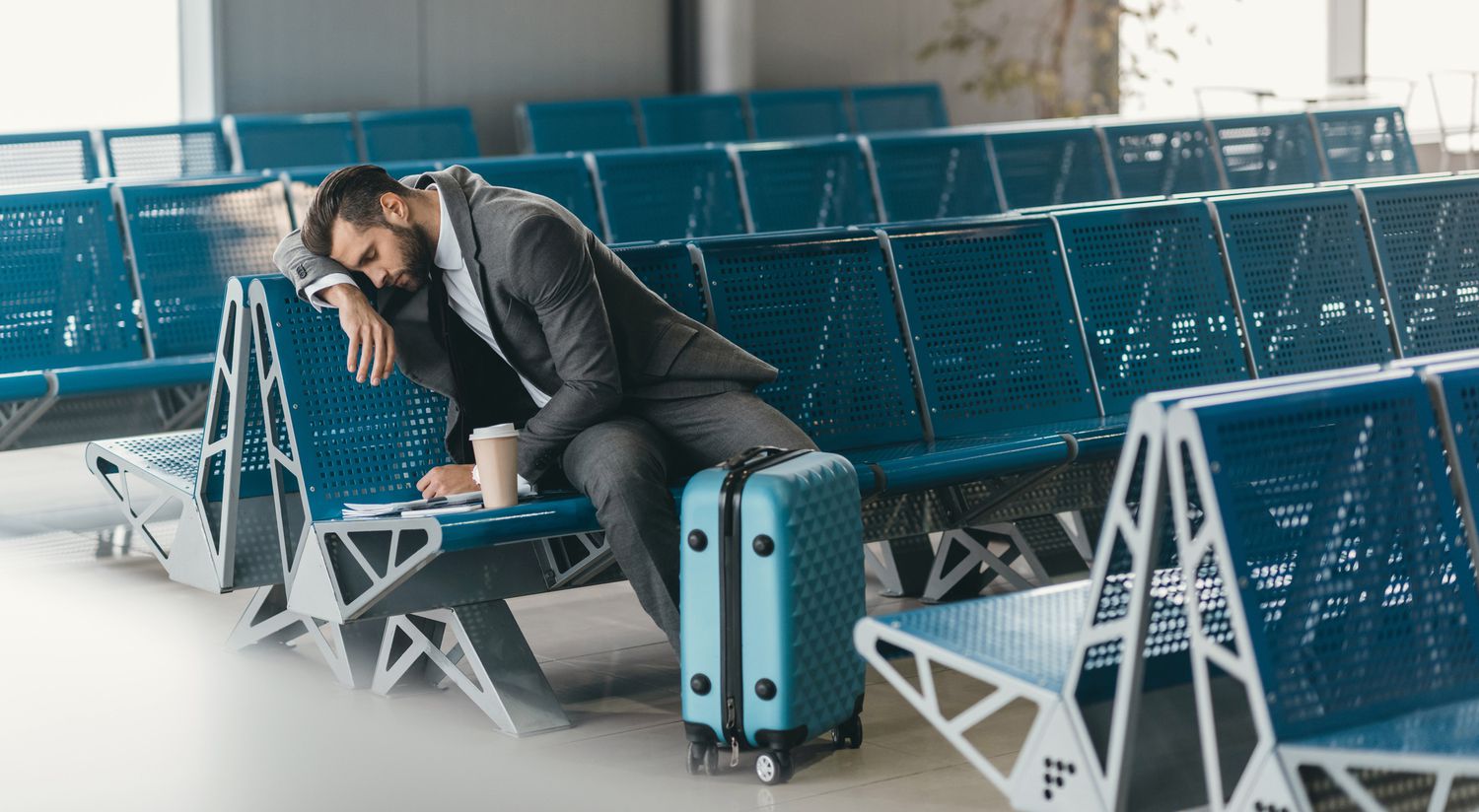 They say when you're sleepy, you can sleep anywhere. They clearly never tried sleeping in an airport.